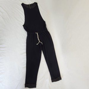 BEBE Black Relaxed Fit Jumpsuit Size S 68% Super Soft and Comfortable  Exc. Cond